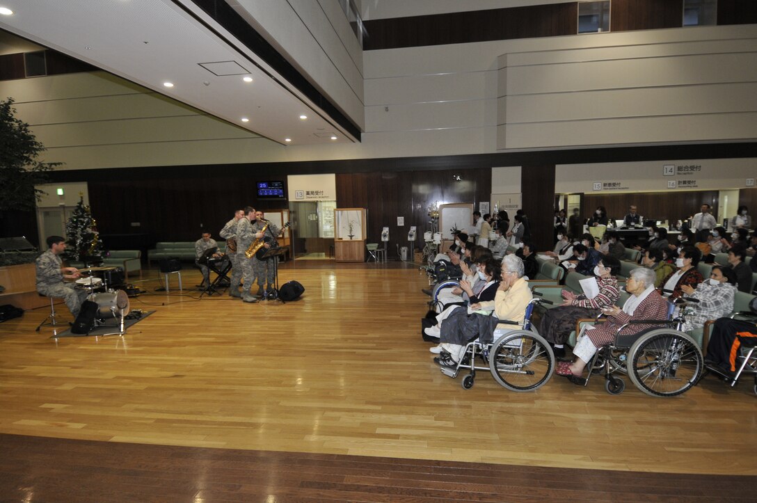 MISAWA, JAPAN -- The USAF Band of the Pacific-Asia Jazz Combo performs Christmas carols for residents and staff at Misawa Municipal Hospital, Misawa, Japan on Dec. 11, 2012.   The group spent three days performing at Misawa Air Base and the local community spreading holiday cheer and building cultural relationships.  (US Air Force Photo/Tech. Sgt. Phillip Butterfield)