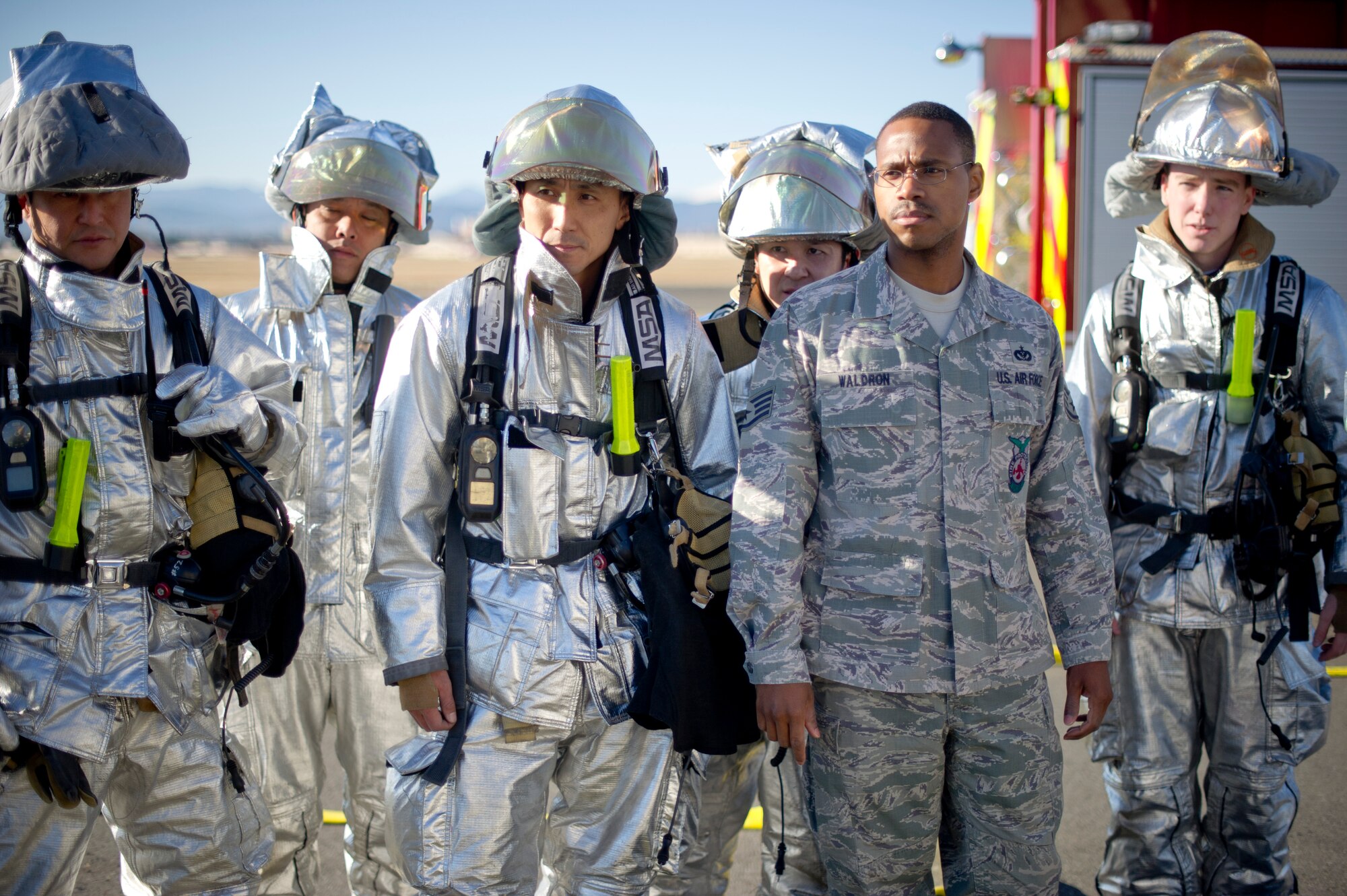 YOKOTA AIR BASE, Japan-- Firefighters from the 374th Civil Engineer Squadron at Yokota Air Base, Japan, receive a safety briefing before beginning a structural burn training exercise on Dec. 13, 2012. Firefighters conduct training of some kind almost every day as a part of their normal workday. (U.S. Air Force photo by Staff Sgt. Stacy Moless))