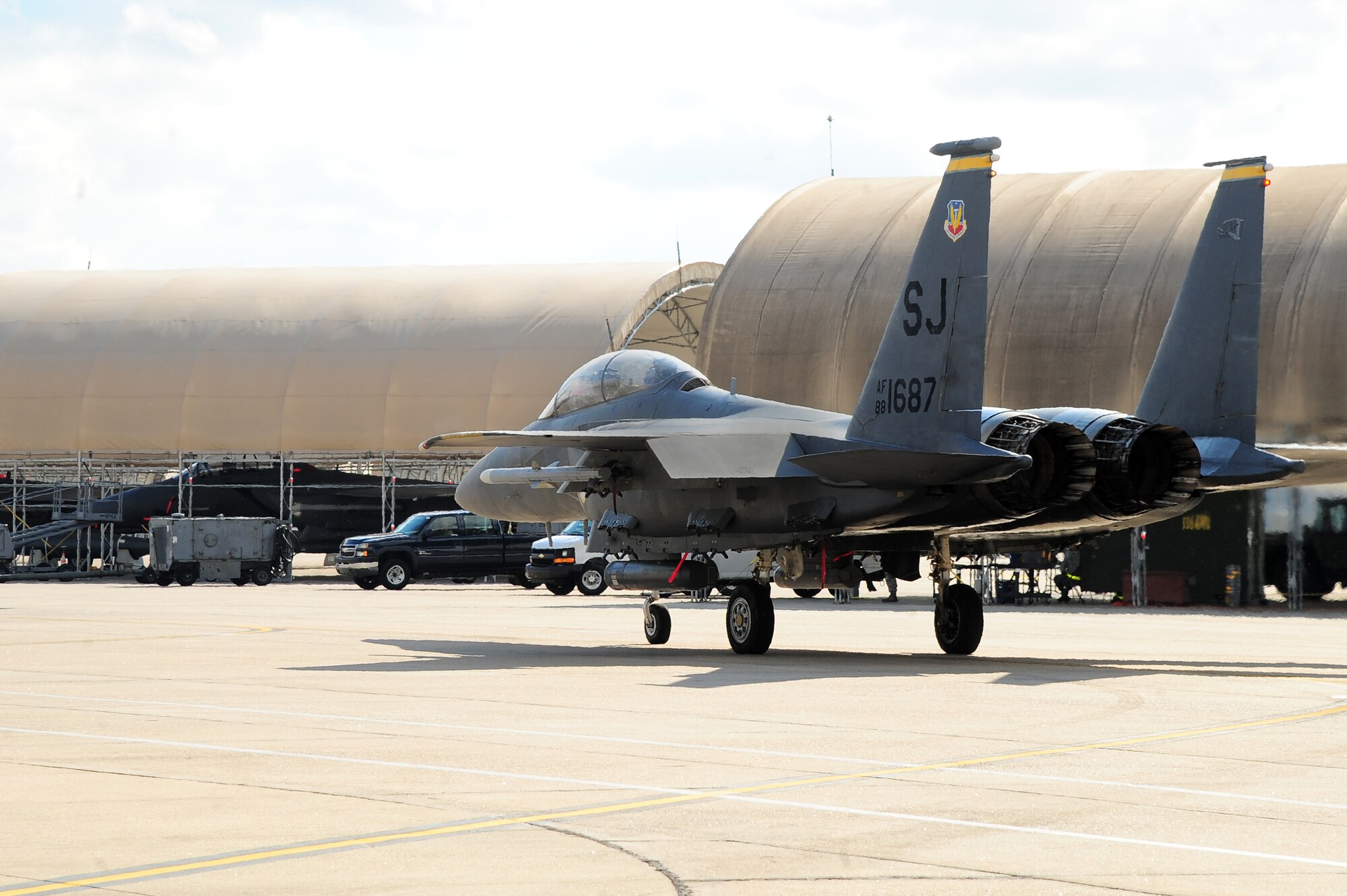 An F-15E Strike Eagle taxis onto the flight line during Operational Readiness Exercise Coronet Warrior 12-06 on Seymour Johnson Air Force Base, N.C., Dec. 18, 2012. Strike Eagle aircrew simulated a deployment to eliminate enemy ground and air threats in addition to protecting the base. (U.S. Air Force photo/Airman 1st Class Aubrey White/Released)