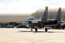 An F-15E Strike Eagle taxis onto the flight line during Operational Readiness Exercise Coronet Warrior 12-06 on Seymour Johnson Air Force Base, N.C., Dec. 18, 2012. Strike Eagle aircrew simulated a deployment to eliminate enemy ground and air threats in addition to protecting the base. (U.S. Air Force photo/Airman 1st Class Aubrey White/Released)