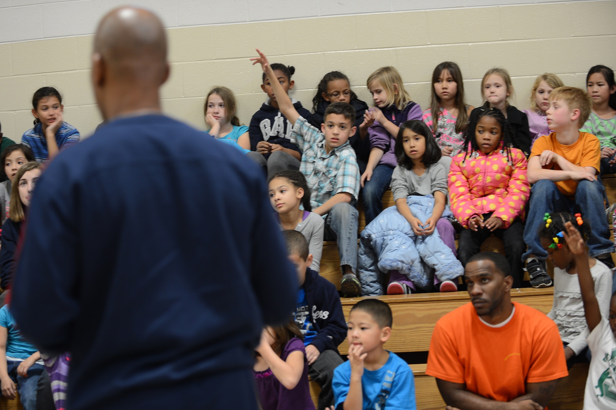 Kids listen to Derrick Stafford, National Basketball Association referee, speak at the Shaw Air Force Base youth center, S.C., Dec. 14, 2012.  Stafford is in his 25th NBA season and has served twice on the executive board of the NBA Referee Association.  (U.S. Air Force photo by Airman 1st Class Nicole Sikorski/Released)