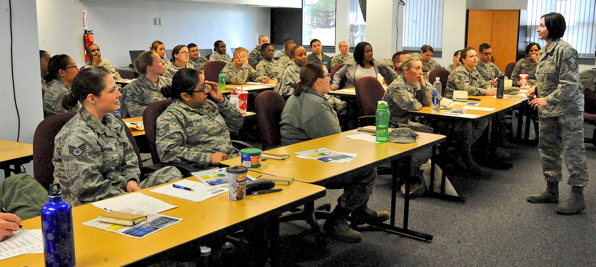 Master Sgt. Jeanette Spain, senior master resilience trainer, teaches resiliency training Dec. 14, to Airmen at Dover Air Force Base, Del. The training seeks to achieve Air Mobility Command’s goal of providing focused resilience training to assist Airmen and their families. The purpose of resilience training is to teach the skills that enable mental toughness, optimal performance, strong leadership and goal achievement. (U.S. Air Force photo by Airman 1st Class Ashlin Federick)