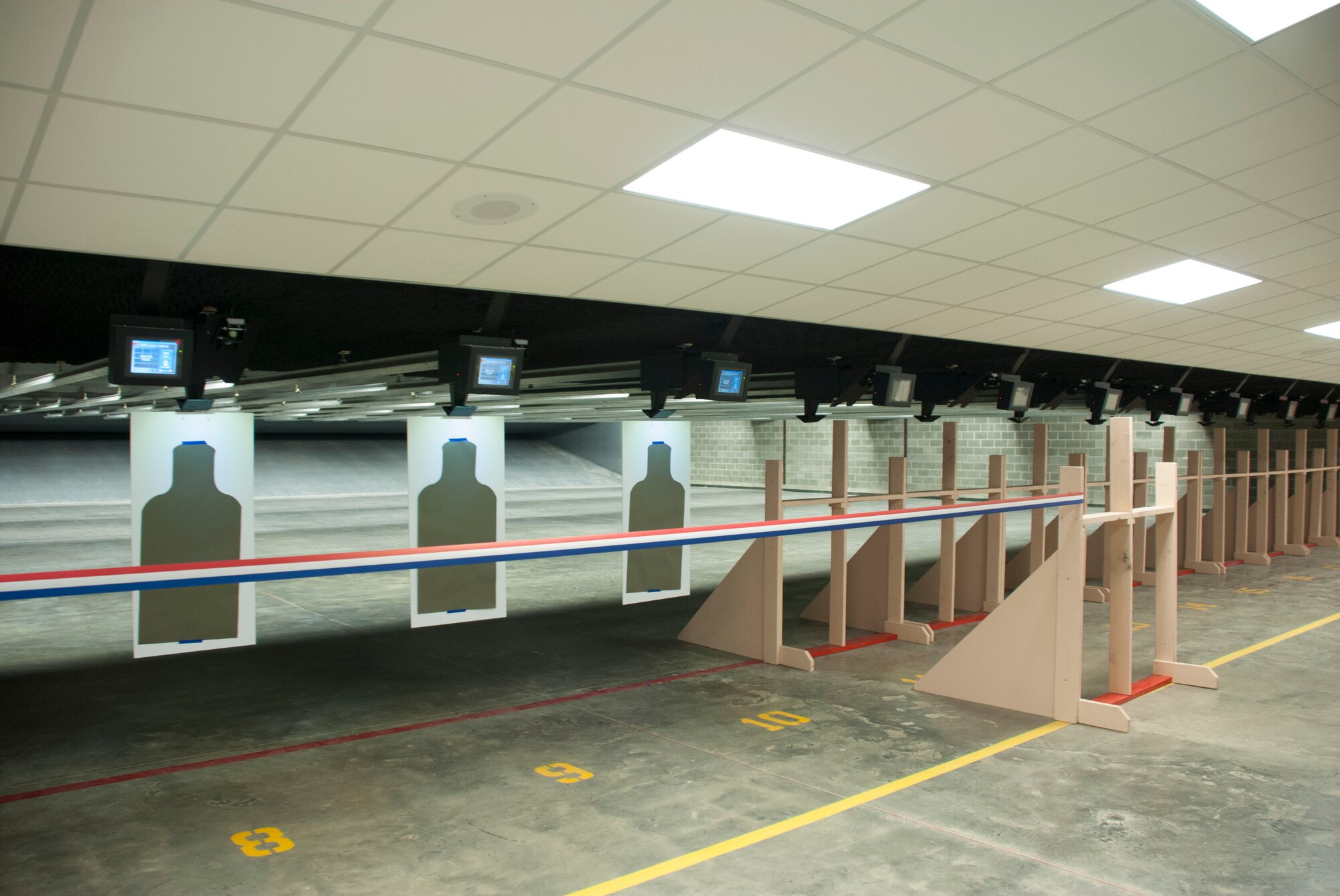 Twenty-one lanes sit ready to use for military and government agencies at the newly opened indoor firing range at the Niagara Falls Air Reserve Station. The firing range took 14 months to build at a cost of 6.5 million dollars. In addition to the numerous firing lanes, the facility boasts classrooms for training proposes, a weapons cleaning room as well as office space for U.S. Air Force combat arms instructors. (U.S. Air Force photo by Tech. Sgt. Andrew Caya)

