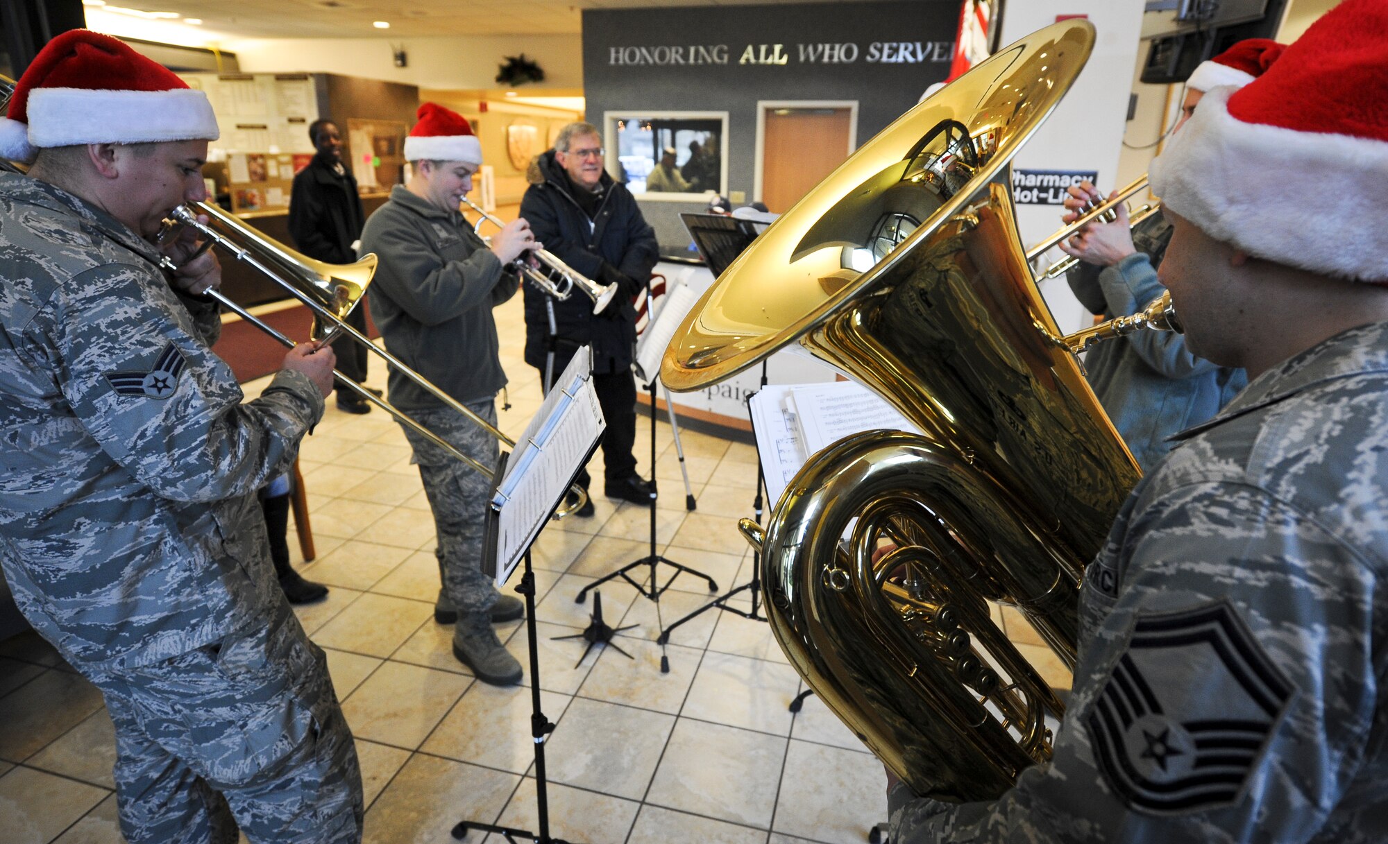 The Golden West Brass Quintet from Travis Air Force Base, Calif., plays holiday songs for patients, visitors and staff of the Veterans Administration Hospital in Spokane, Wash., Dec. 13, 2012. The band visited Fairchild and the surrounding community Dec. 13 and 14, playing holiday classics such as “We wish you a Merry Christmas” and “Jingle Bell Rock.” (U.S. Air Force photo by Senior Airman Benjamin Stratton)