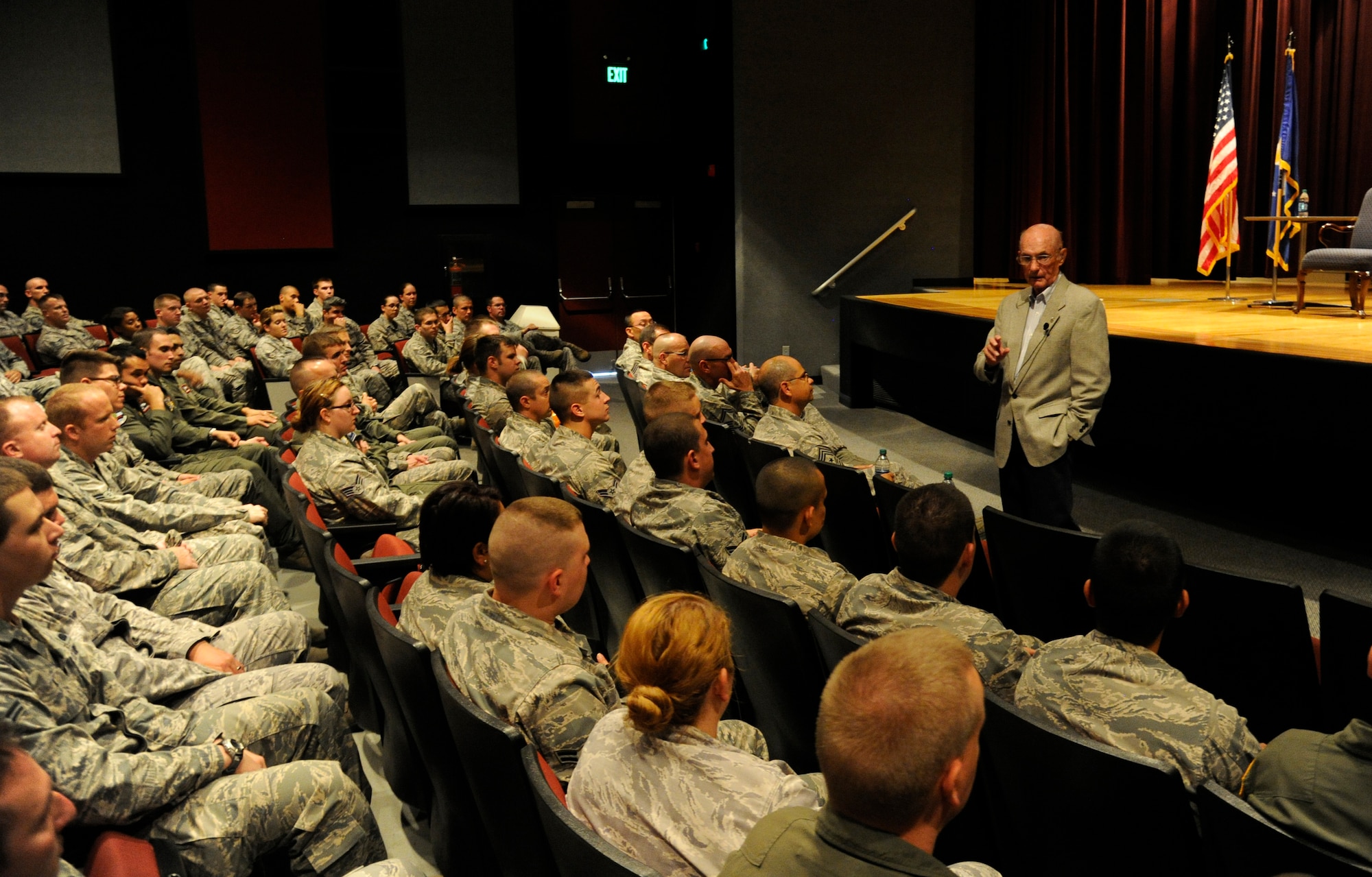 Retired Chief Master Sergeant of the Air Force James McCoy speaks during the enlisted all-call in the base theatre at Fairchild Air Force Base, Wash., July 27, 2012. McCoy retired from active duty in November 1981 with more than 30 years of service. He still tours the country speaking with Airmen of all ranks offering helpful and insightful advice. (U.S. Air Force photo by Airman 1st Class Ryan Zeski)