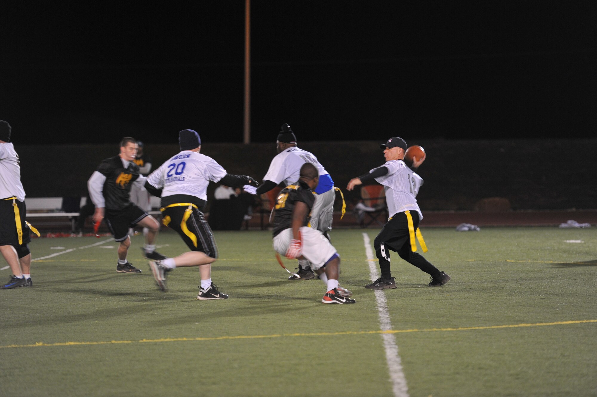 GOODFELLOW AIR FORCE BASE, Texas- Charlie Rehburg, 17th Training Wing resource advisor, prepares to throw the ball in the  Flag Football Intramural Championship game at the football field here, Dec. 12. Rehburg played on the Junk Yard Dogs team, who won the championship game with a score of 33-13. (U.S. Air Force photo/ Airman 1st Class Erica Rodriguez)