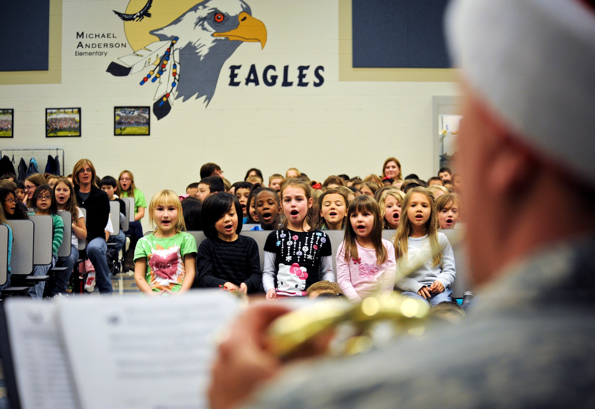The Golden West Brass Quintet from Travis Air Force Base, Calif., plays for students and faculty at Michael Anderson Elementary School during the band’s visit to Fairchild Air Force Base, Wash., Dec. 14, 2012. The band visited Fairchild and the surrounding community Dec. 13 and 14, playing holiday classics such as “We wish you a Merry Christmas” and “Jingle Bell Rock.” (U.S. Air Force photo by Senior Airman Benjamin Stratton)