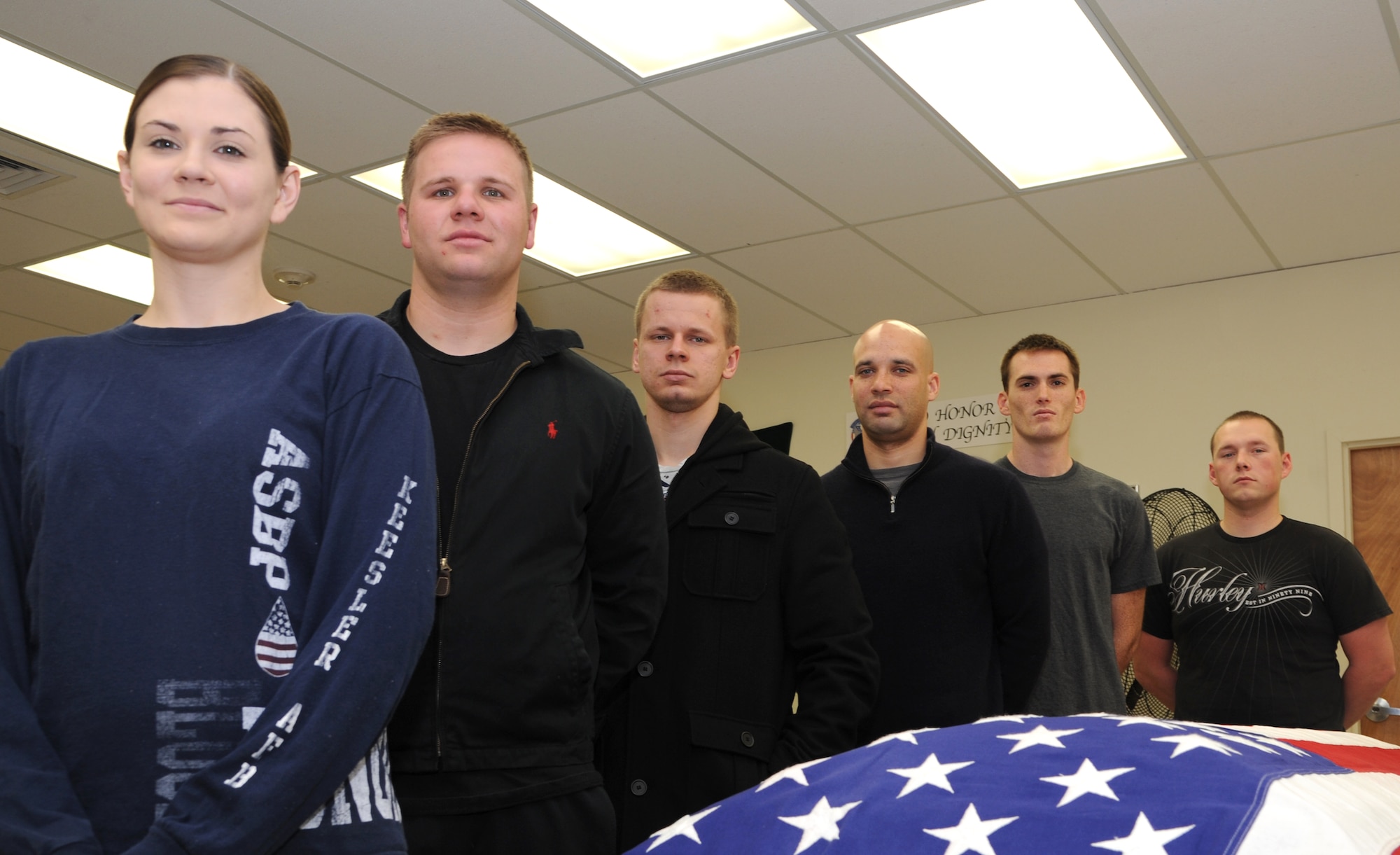 Members of the Silver Talon Honor Guard at Vance Air Force Base, Okla., responded to a vehicle crash near the cemetery where they were scheduled to perform a funeral detail Dec. 12. From left are Staff Sgt. Megan Lunderman, Senior Airman Beau Brouillette, Senior Airman Bill Logel, Airman 1st Class Clarence Kalik-Underwood, Senior Airman Josh Becerra and Airman 1st Class Anthony Marple. Also with the funeral detail was Senior Airman Eric Ruiz-Garcia. (U.S. Air Force photo/ Airman 1st Class Frank Casciotta)