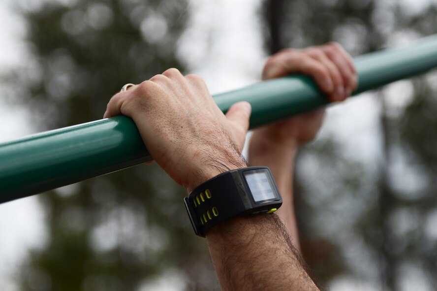 The incline bar offers Airmen a variety of upper-body work outs that simulate climbing. (U.S. photo by Airman 1st Class Daniel Blackwell/Released)