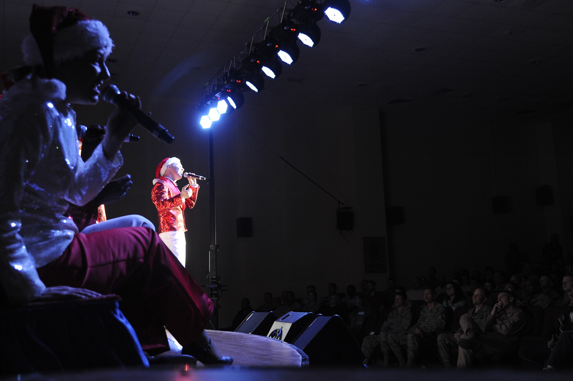 The U.S Air Force entertainment unit, Tops In Blue, perform a holiday themed show for deployed military personnel at an undisclosed location in Southwest Asia on Dec. 17, 2012.  Since its first world tour in 1953, the Tops In Blue have served as ambassadors for the United States of America.  (U.S Air Force photo by Staff Sgt. Austin Knox/ Released) 