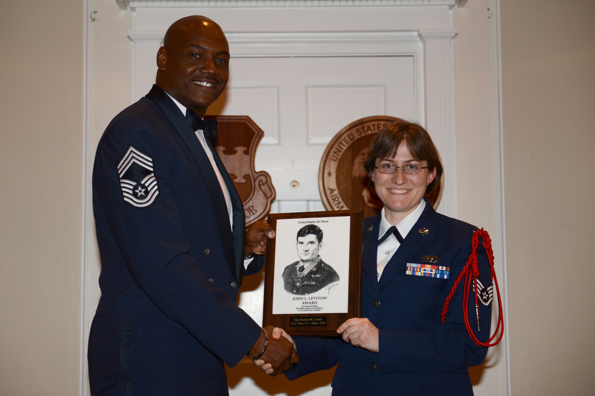 Staff Sgt. Rachel Lulich, 48th Intelligence Surveillance and Resonance Group standardization evaluation liaison officer, won the John L. Levitow Award for her performance during Airman Leadership School at Shaw Air Force Base, S.C. Dec. 13, 2012.  The award is presented to the top student of the class for overall excellence as both a leader and a scholar. (U.S. Air Force photo by Airman 1st Class Krystal Jeffers/Released)
