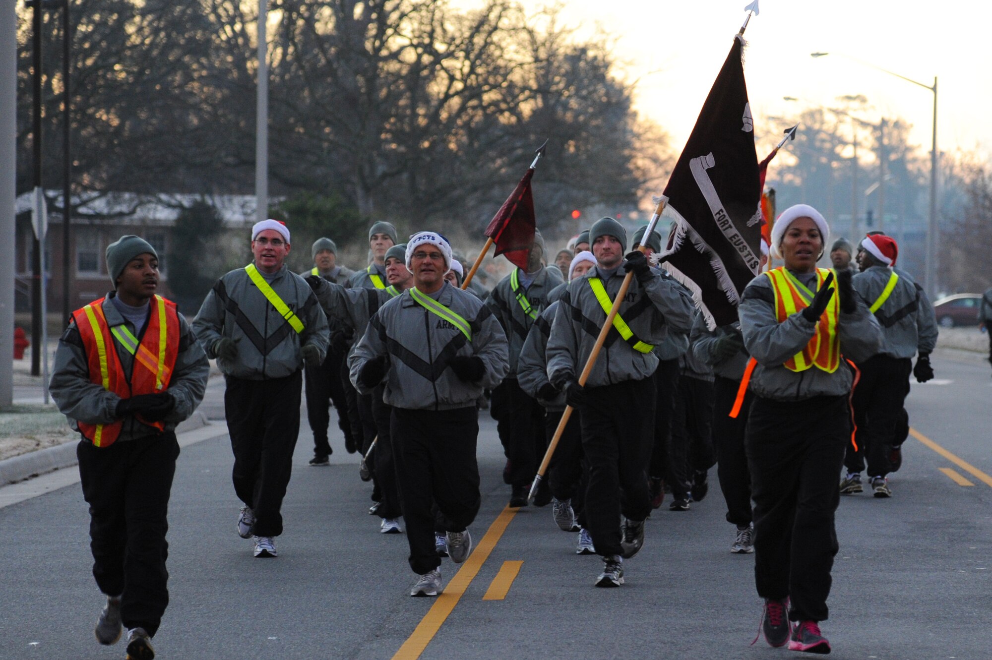 Volunteers run during the Holiday Run at Fort Eustis, Va., Dec. 14, 2012. More than 3,500 Soldiers participated in the event which benefitted the Toys for Tots program. (U.S. Air Force photo by Airman 1st Class Victoria Taylor/Released)