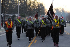 Volunteers run during the Holiday Run at Fort Eustis, Va., Dec. 14, 2012. More than 3,500 Soldiers participated in the event which benefitted the Toys for Tots program. (U.S. Air Force photo by Airman 1st Class Victoria Taylor/Released)
