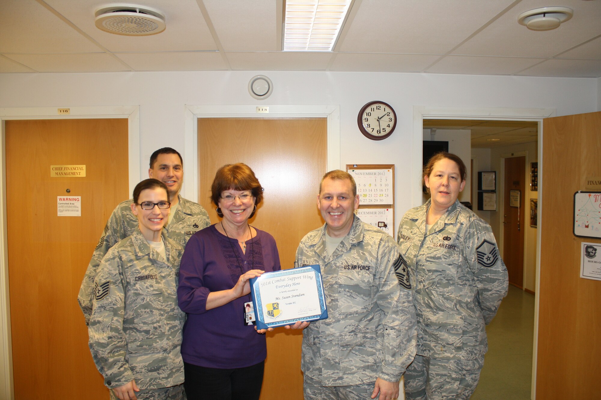 STAVANGER, Norway -- Susan Svendsen, 426th Air Base Squadron civilian pay administrator/accounting liaison, was named November’s 501st Combat Support Wing Everyday Hero from the 423rd Air Base Group. Svendsen oversees the Local National Direct Hire civilian payroll and leave program, implementing a paperless payroll system at Stavanger. She also reviewed the open document listing for NATO’s Joint Warfare Centre, increasing the funds available for year-end purchases, as well as coordinating the necessary documents to ensure a seamless turnover to Fiscal Year 2013. When the primary cashier was absent, Svendsen also cashed $170,000 for 42 servicemembers enabling them to pay their Norwegian rent and utility bills in a timely manner. (U.S. Air Force photo illustration by Capt. Brian Maguire)