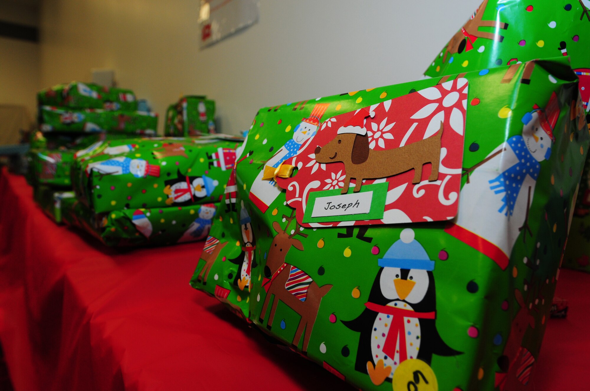 DUXFORD IMPERIAL WAR MUSEUM, England – Gifts, donated by members of the 492nd Fighter Squadron, wait to be given to during a Christmas party at Duxford Imperial War Museum, Dec. 15, 2012. The 492nd Fighter Squadron hosted this year’s annual children’s Christmas party which was attended by more than 40 children including many from U.K. hospitals. (U.S. Air Force photo by Airman 1st Class Cory D. Payne)