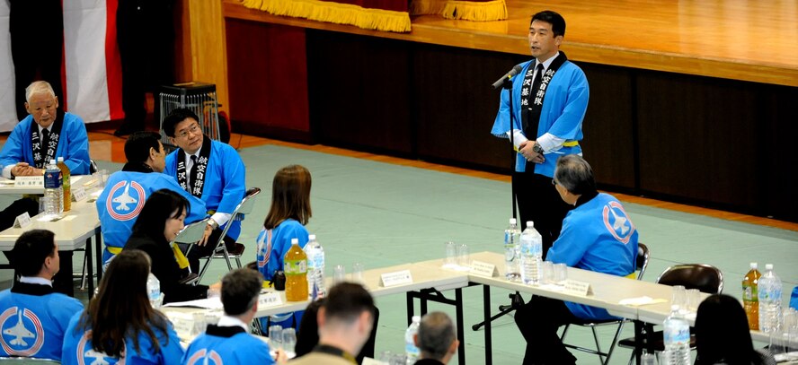 Maj. Gen. Tamotsu Kidono, Japan Air Self-Defense Force 3rd Air Wing commander, spoke during the annual mochi-pounding ceremony in the JASDF gym at Misawa Air Base, Japan, Dec. 14, 2012. After making the glutinous rice into gummy rice cakes, guests and participants were given the opportunity to eat them. (U.S. Air Force photo by Airman 1st Class Kenna Jackson)