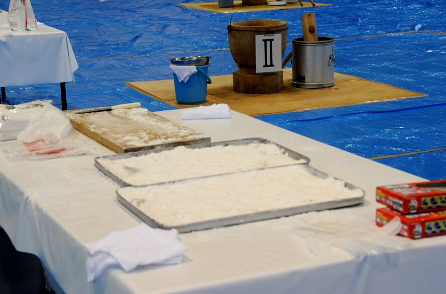 Mochi making equipment is laid out inside the Japan Air Self-Defense Force gymnasium in preparation for the mochi-pounding ceremony at Misawa Air Base, Japan, Dec. 14, 2012. During the annual event, where participants made mochi-tsuki, the American and Japanese community came together to share the Japanese tradition. (U.S. Air Force photo/Airman 1st Class Kenna Jackson)