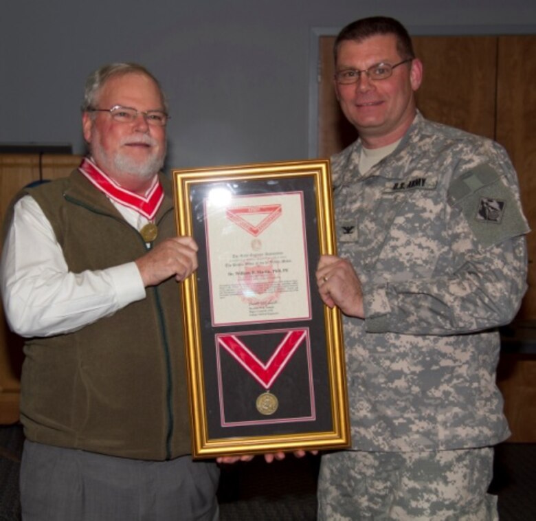 ERDC-CHL Director Dr. William Martin and ERDC Commander Col. Kevin Wilson. Martin received the Bronze Order of the de Fleury.