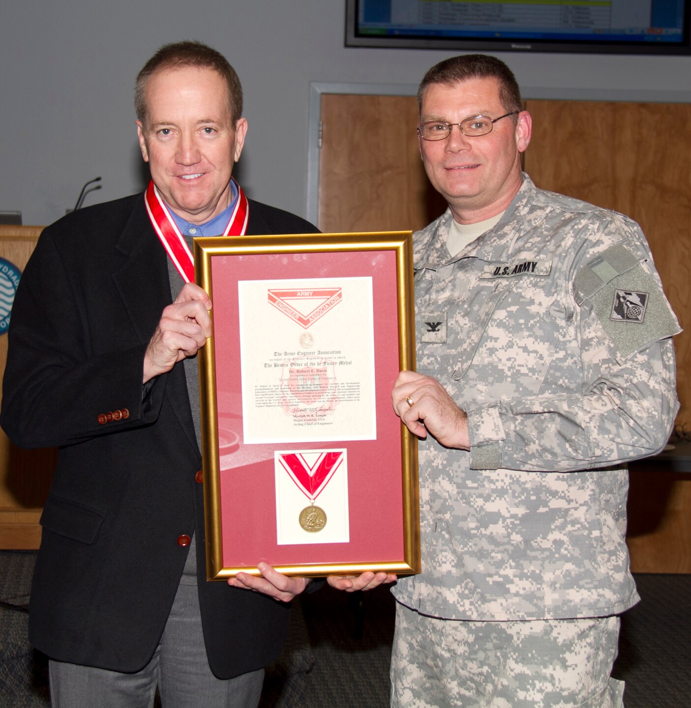 ERDC-CRREL Director Dr. Robert Davis and ERDC Commander Col. Kevin Wilson.  Davis received the Bronze Order of the de Fleury medal.