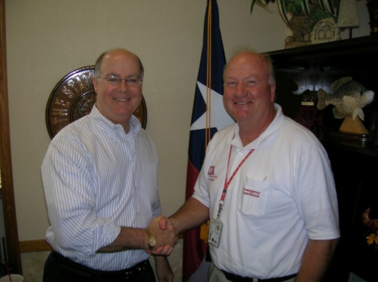 Shown during the Hurricane Ike response, ERDC Construction Engineering Research Laboratory Electrical Engineer Steve Sweeney, right, and the Tyler County, Texas, judge.