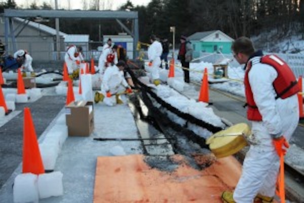 Oil spill responders from Prudhoe Bay, Alaska, recently trained at ERDC-CRREL on equipment for oil spill recovery and cleanup. The field practical portion included proficiency checks in spill site safety and techniques. 