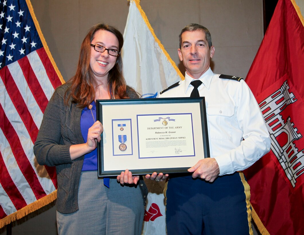 Rebecca Graser, St. Paul District employee and Waukesha, Wis., resident receives an Army 
Achievement Medal for Civilian Service from Col. Michael Price, St. Paul District commander, in St. Paul, Minn., Dec. 14, 2012.