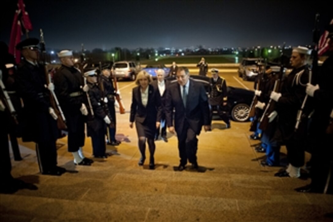 Secretary of Defense Leon E. Panetta escorts Norwegian Minister of Defense Anne-Grete Strøm-Erichsen through an honor cordon and into the Pentagon on Dec. 17, 2012.  Panetta and Strøm-Erichsen are meeting to discuss national security items of interest to both nations