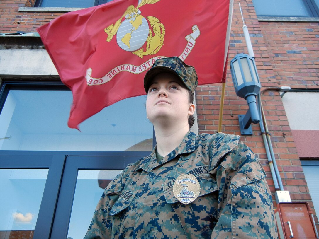 Lance Cpl. Kadie Tallentire stands in front of the Provost Marshall Office aboard Marine Corps Base Quantico on Tuesday. Tallentire is one of many Marines who will stand duty on Christmas Eve and Day.    