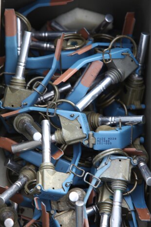 A pile of grenade fuses await destruction during a demolition conducted by Ammunition Company, 2nd Supply Battalion, 2nd Marine Logistics Group aboard Camp Lejeune, N.C., Dec. 4, 2012. The company gathered obsolete ordnance for the operation and established 17 high-explosive caches as a method of training the unit’s Marines to handle the various types of hazards they might encounter in the field.