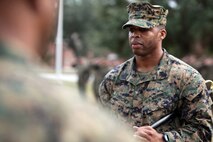 Sgt. Maj. Anthony L. Crutcher, the outgoing sergeant major of Combat Logistics Regiment 2, 2nd Marine Logistics Group, holds the Sword of Office during an appointment and relief ceremony aboard Camp Lejeune, N.C., Dec. 11, 2012.  Crutcher will assume responsibilities as the sergeant major of Combat Logistics Regiment 27, 2nd MLG until his departure for Tampa, Fl.