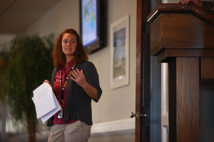 Charity M. Rychak, an environmental restoration manager, speaks about past contamination incidents on Camp Lejeune, N.C., Dec. 5, 2012.  Rychak discussed several challenges Marines face with pollution, but also mentioned how the environment is healthier than it was in the past. 