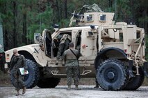 Marines with Combat Logistics Battalion 6, 2nd Marine Logistics Group load a Mine Resistant Ambush Protected All-Terrain Vehicle during a three-day field exercise aboard Camp Lejeune, N.C., Dec. 11-13, 2012. Servicemembers with the battalion used a variety of vehicles in their convoys and went on missions for many hours while practicing immediate action drills against role players ambushing the convoy.