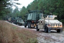 Marines with Combat Logistics Battalion 6, 2nd Marine Logistics Group roll out on a convoy during a field exercise aboard Camp Lejeune, N.C., Dec 11-13, 2012. Troops with the battalion stayed in the field for three days and conducted a convoy each day with a different mission.