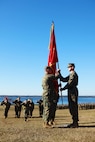 Col. Gary F. Keim (left), the new commander of Combat Logistics Regiment 27, 2nd Marine Logistics Group, receives the regimental colors from Col. Mark R. Hollahan, CLR-27’s outgoing commanding officer, during the unit’s change of command ceremony aboard Camp Lejeune, N.C., Dec. 14, 2012. Hollahan departed the regiment after spending more than two years with the unit. 