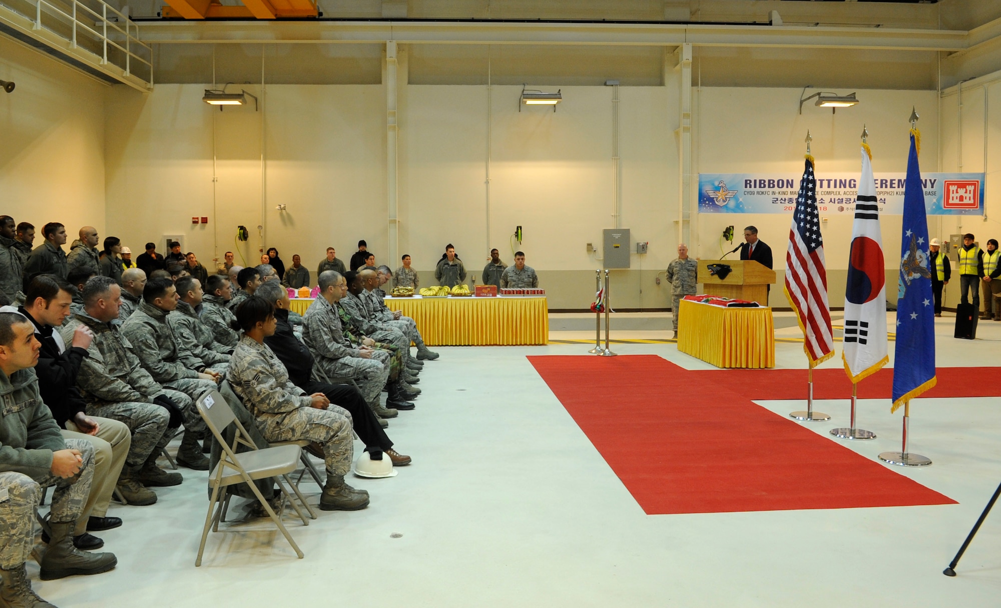 Samuel Adkins, U.S. Army Corps of Engineers Far East District construction division chief, addresses the audience during a ribbon-cutting ceremony for the new 8th Maintenance Squadron accessory shop Dec. 18, 2012, at Kunsan Air Base, Republic of Korea. This was the final phase in a three-part project aimed at increasing the squadron’s efficiency in carrying out its mission. (U.S. Air Force photo by Senior Airman Brigitte N. Brantley/Released)