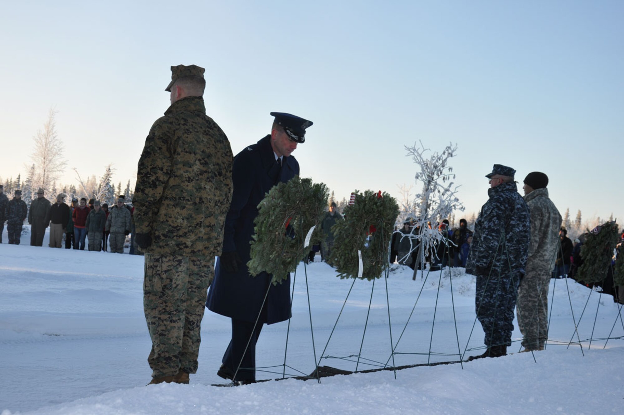 Air Force Col. Brian P. Duffy prepares to salute at the Wreaths Across America ceremony Dec. 15 at the Fort Richardson National Cemetery. Leadership from all branches of military service as well as civic organizations were on hand to lay wreaths on the graves of those interred at the cemetery. (U.S. Air Force photo/Erin Eaton)

