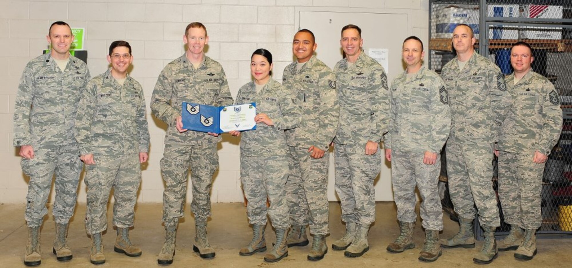 Congratulations to Tech. Sgt. Valerie Taitingfong, 5th Communications Squadron, on her recent STEP promotion. Taitingfong is shown receiving her new stripe from Col. James Dawkins, 5th Bomb Wing commander. (U.S. Air Force photo/ Airman 1st Class Kristoffer Kaubisch)