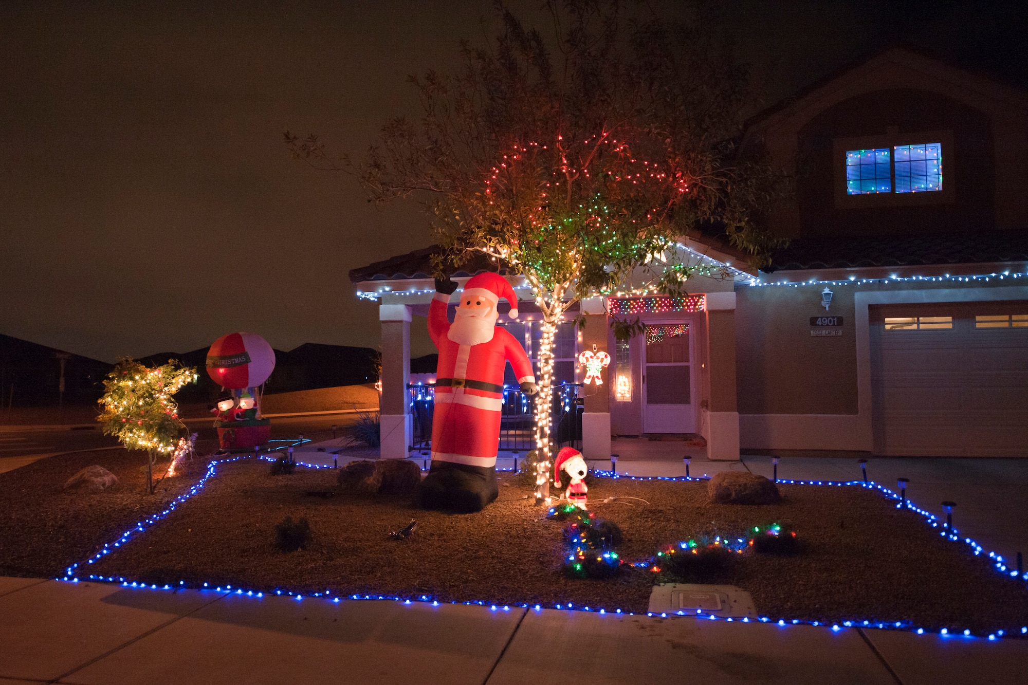 Nellis Air Force Base housing is lit up for the holiday season Dec. 17, 2012. Enjoy the holiday lights on base with safety in mind. Keep your eye on the road while driving and pull over if you wish to enjoy them longer.  (U.S. Air Force photo by Caitlin Kenney)