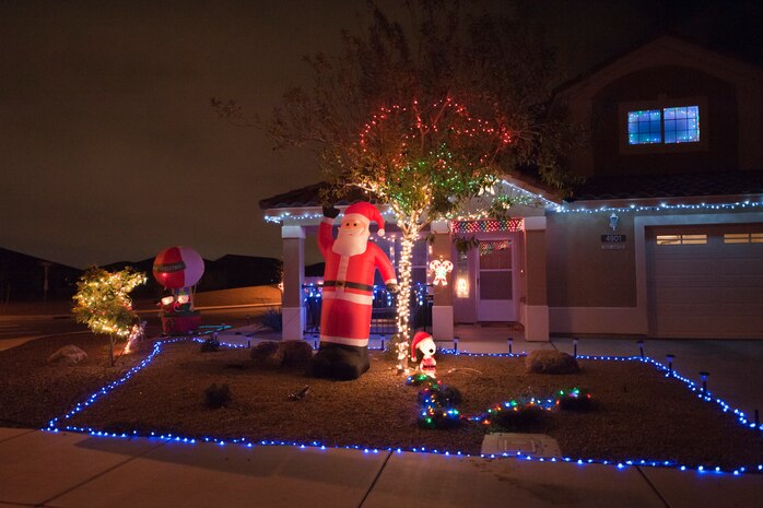 Nellis Air Force Base housing is lit up for the holiday season Dec. 17, 2012. Enjoy the holiday lights on base with safety in mind. Keep your eye on the road while driving and pull over if you wish to enjoy them longer.  (U.S. Air Force photo by Caitlin Kenney)