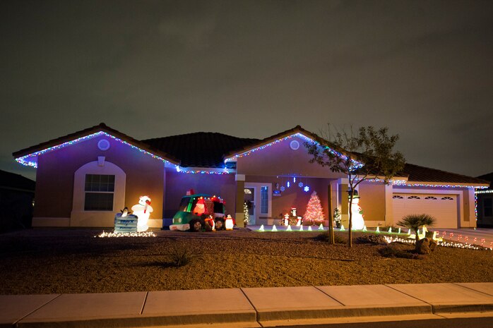 Nellis Air Force Base housing is lit up for the holiday season Dec. 17, 2012. Families around the base are decorating their homes to celebrate the holidays and the New Year.  (U.S. Air Force photo by Caitlin Kenney)