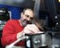 Mark Montville prepares the places the "Star Spangled Banner" reel on the projection machine.  Each reel contains about 20 minutes of content.  The role of the projectionist is to prepare a film to play seamlessly.  (U.S. Air Force photo/Staff Sgt. Maria Bowman)