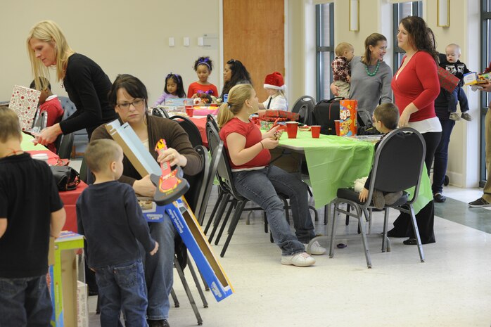 Parents and children of deployed Joint Base Charleston members enjoy the third Annual Deployed Children’s Holiday Party Dec. 15, 2012, at JB Charleston – Air Base, S.C. (U.S. Air Force photo/ Master Sgt. Maria Bare)