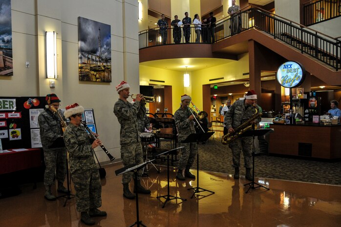 The U.S. Air Force Heritage Ramblers Dixieland Ensemble from Langley Air Force Base, Va., plays holiday music Dec. 13, 2012, at the Naval Health Clinic on Joint Base Charleston – Weapon Station, S.C. Six members from the USAF Heritage Ramblers performed holiday carols at several commands on the Air Base and Weapons Station. The USAF Heritage Ramblers, a part of the Heritage of America Band, was formed in 2010. The group's mission is to preserve and present the rich heritage of traditional jazz. With the music of such legends as Louis Armstrong, Sidney Bechet, Jack Teagarden, and Bix Beiderbecke as their guide, Heritage Ramblers bring the New Orleans and Chicago styles of traditional jazz to life in each performance. (U.S. Air Force photo/ Airman 1st Class Jared Trimarchi)