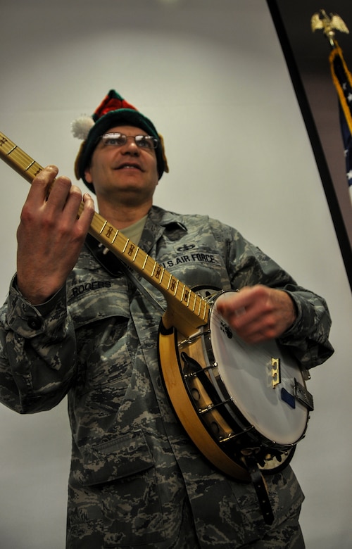 Staff Sgt. Tim Rogers, U.S. Air Force Heritage Ramblers Dixieland Ensemble’s banjo player, plays the song ‘Jingle Bell Rock’  Dec, 13, 2012, at the Space and Naval Warfare Systems Command on Joint Base Charleston – Weapons Station, S.C.  Six members from the USAF Heritage Ramblers from Joint Base Langley – Eustis, Va., performed holiday carols at several commands on the Air Base and Weapons Station. The USAF Heritage Ramblers, a part of the Heritage of America Band, was formed in 2010. The group's mission is to preserve and present the rich heritage of traditional jazz. With the music of such legends as Louis Armstrong, Sidney Bechet, Jack Teagarden, and Bix Beiderbecke as their guide, Heritage Ramblers bring the New Orleans and Chicago styles of traditional jazz to life in each performance. (U.S. Air Force photo/ Airman 1st Class Jared Trimarchi)