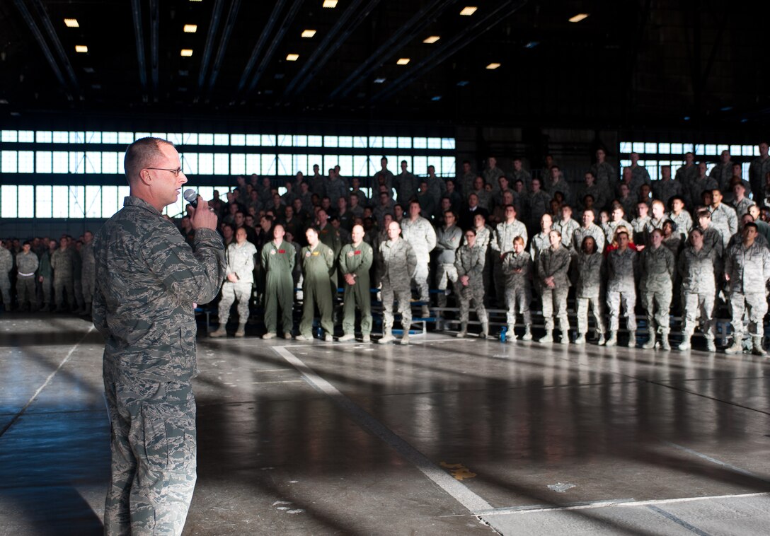Col. Mark Weatherington, 28th Bomb Wing commander, speaks to Airmen during a commander’s call in the Pride Hangar at Ellsworth AFB, S.D., Dec. 13, 2012. Weatherington covered many topics, including safety, morale, and sexual assault and encouraged everyone to be good wingmen and contribute to the welfare of their fellow Airmen. (U.S. Air Force photo by Airman 1st Class Alystria Maurer/Released)