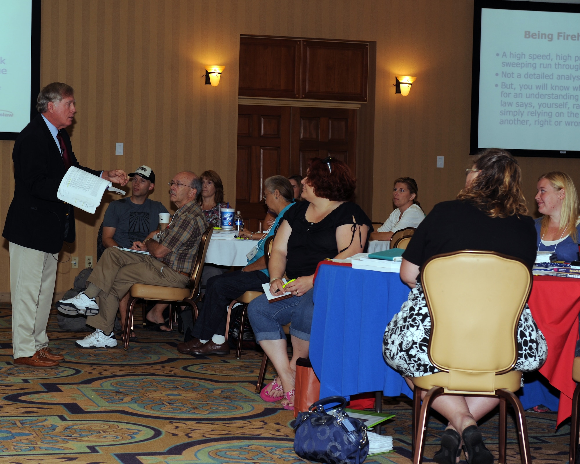 Peter Wright, Wrightslaw attorney, addresses the crowd at a training session for members enrolled in the Exceptional Family Member Program at Davis-Monthan Air Force Base, Ariz., Aug. 18, 2012. For families enrolled in the program on D-M, there are monthly activities to get families involved in the program and to create social settings for families with special needs. (U.S. Air Force photo by Airman 1st Class Timothy Moore)