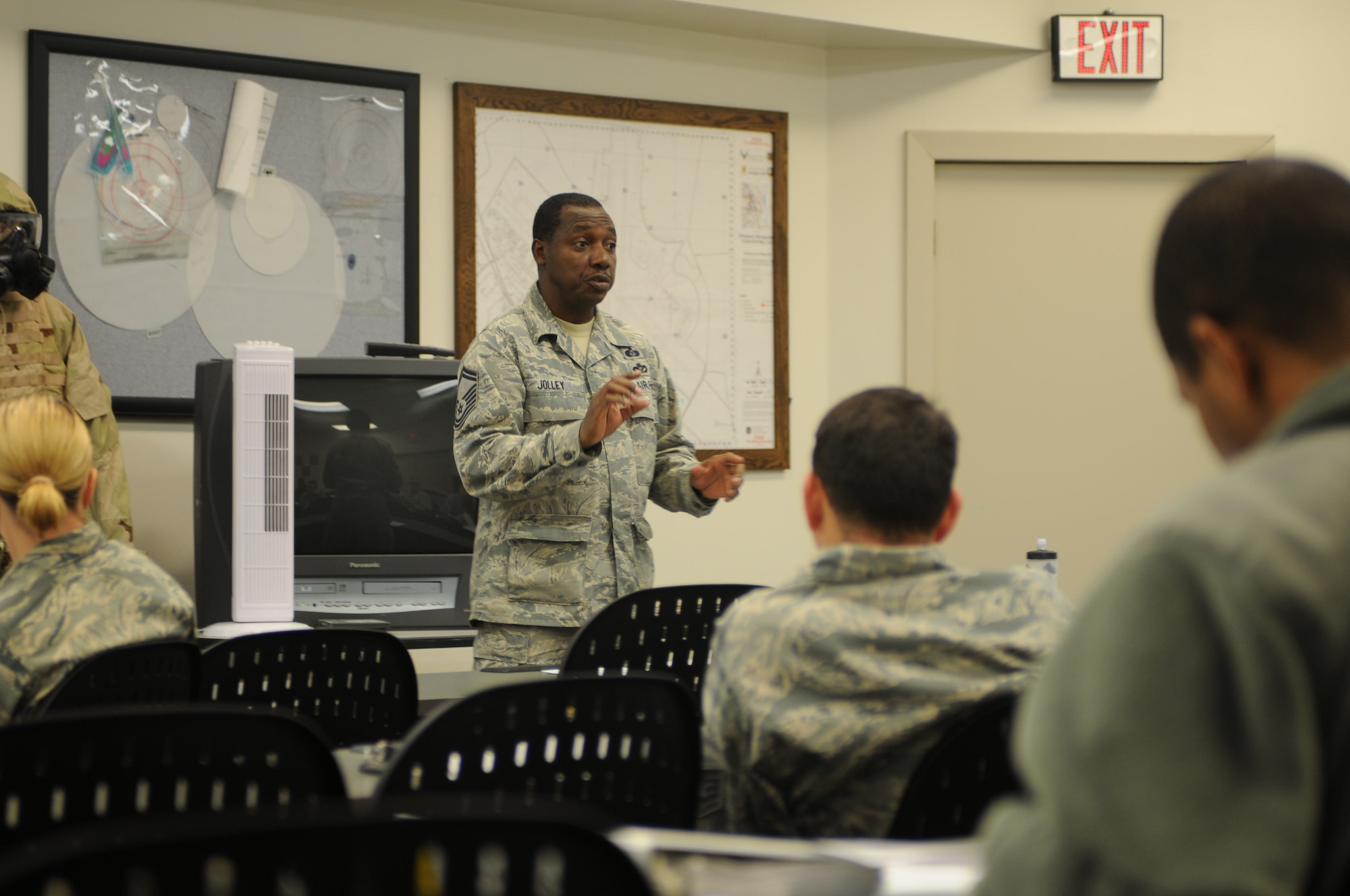 Senior Master Sgt. Cornell Jolley, 512th Civil Engineer Squadron, conducts an emergency management unit briefing for the 512th Airlift Wing's EMU representatives Dec. 2, 2012, on Dover Air Force Base, Del. The training covered equipment for exercises, the emergency management site page on the enterprise information management site, the staff assistance checklist and the representatives' responsibilities. (U.S. Air Force photo/Senior Airman Joe Yanik)
