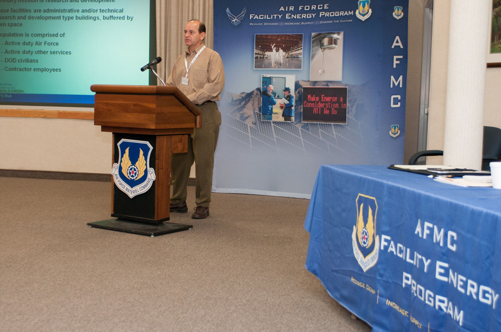 HANSCOM AIR FORCE BASE, Mass. - Bruce Finley, base energy manager, delivers opening remarks during the Energy Industry Days at the Hanscom Conference Center Dec. 11. The two-day forum focused on the latest technology to reduce energy usage and costs. (U.S. Air Force photo by Rick Berry)