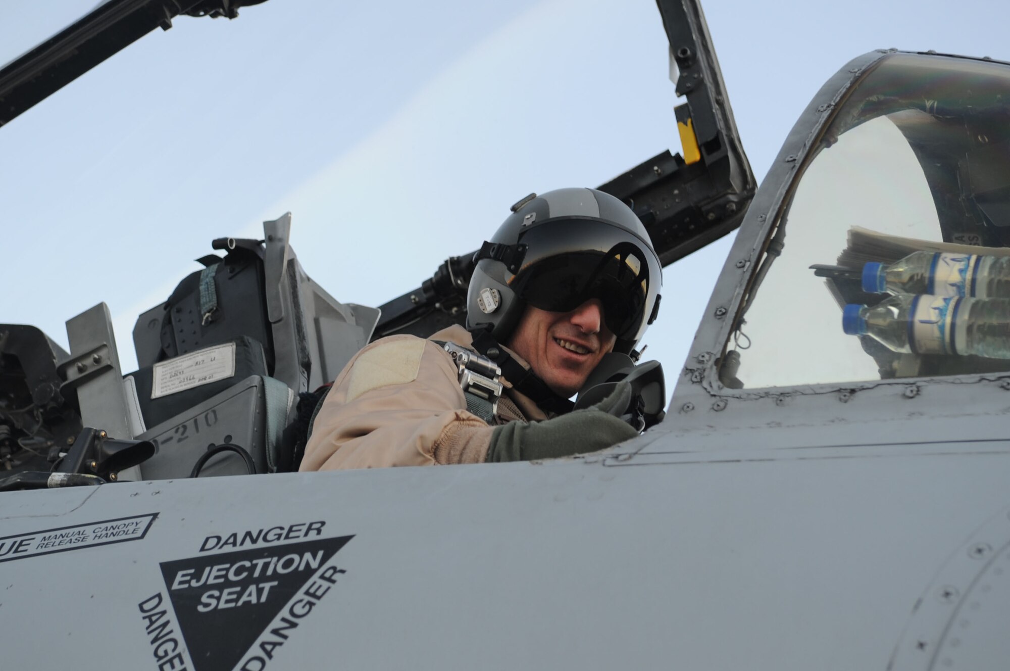 BAGRAM AIRFIELD, Afghanistan - Lt. Col. James 'Kil' Roy, 455th Expeditionary Operations Squadron director of operations, gives a thumbs-up from his A-10 Thunderbolt II prior to taking off, Dec. 19, 2012. Roy recently achieved 1,000 combat hours, all in the A-10 flying missions in Afghanistan. (U.S. Air Force Photo/Staff Sgt. David Dobrydney)