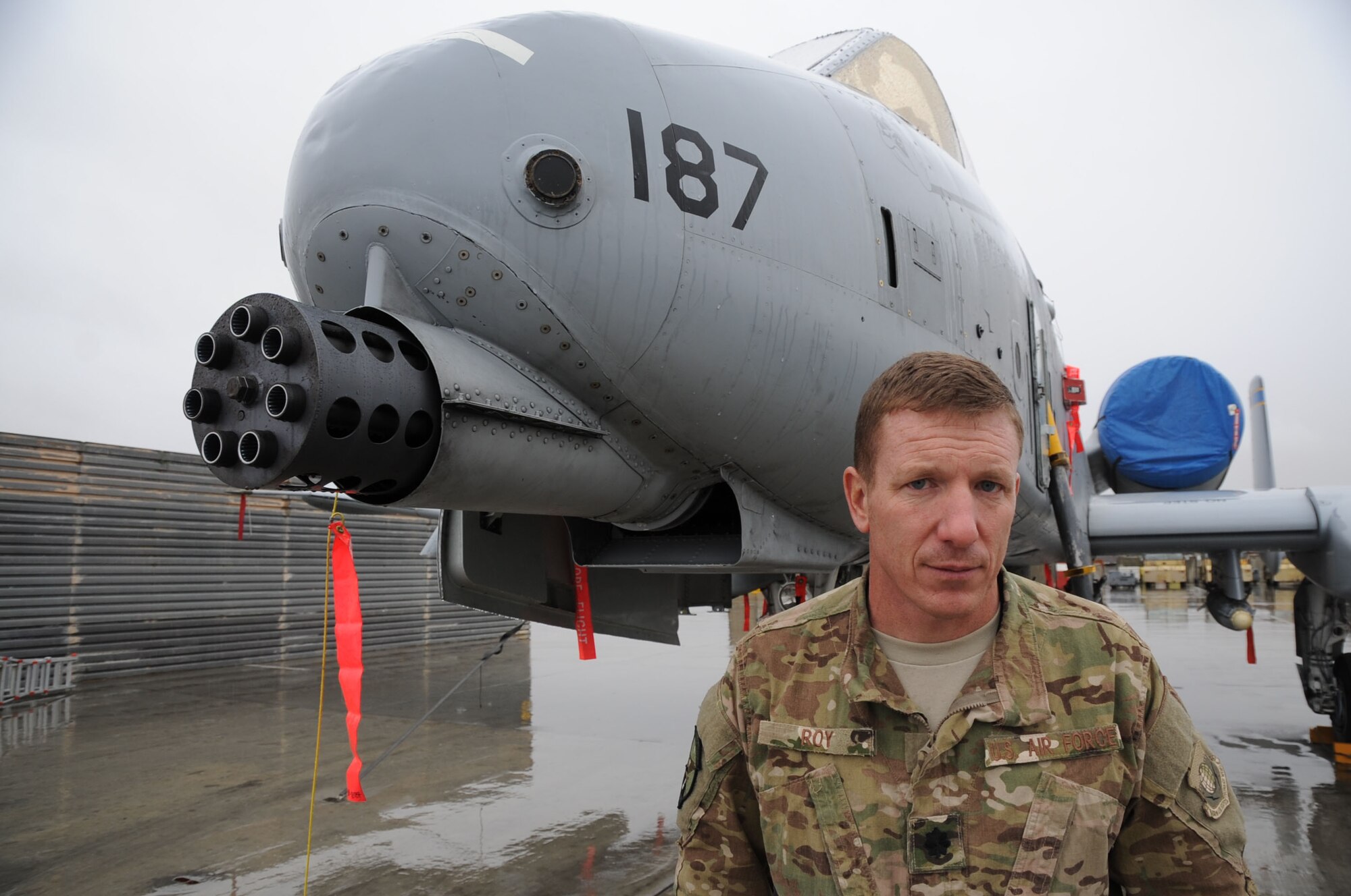BAGRAM AIRFIELD, Afghanistan - Lt. Col. James 'Kil' Roy, 455th Expeditionary Operations Squadron director of operations, stands with an A-10 Thunderbolt II on the flightline here, Dec. 13, 2012. Roy recently achieved 1,000 combat hours, all in the A-10 flying missions in Afghanistan. (U.S. Air Force Photo/Staff Sgt. David Dobrydney)